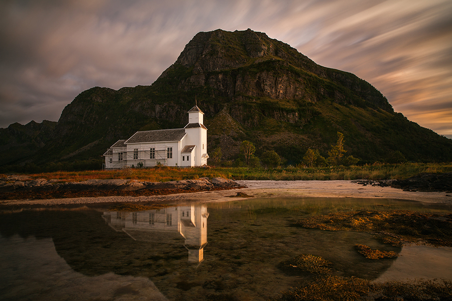 Small church at the foot of a mountain
