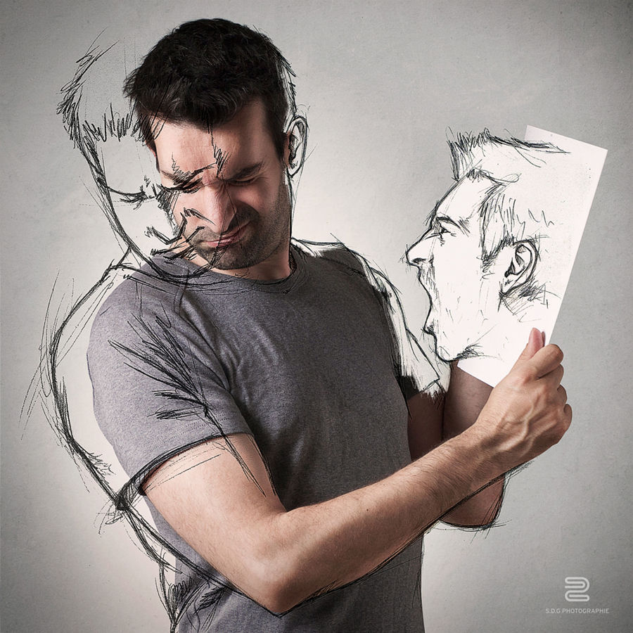 Artist holds a drawing of a face in a composite portrait