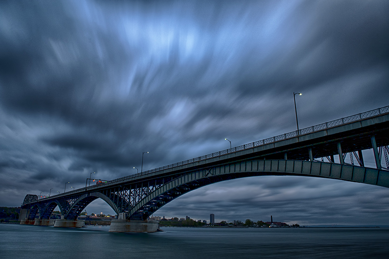 Bridge beneath a stormy Niagara sky