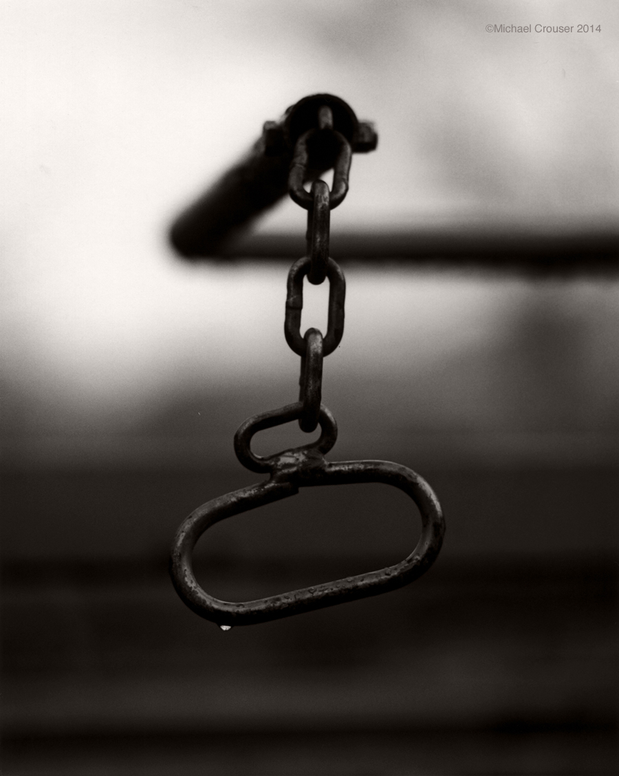 Close-up of a metal hook and chain
