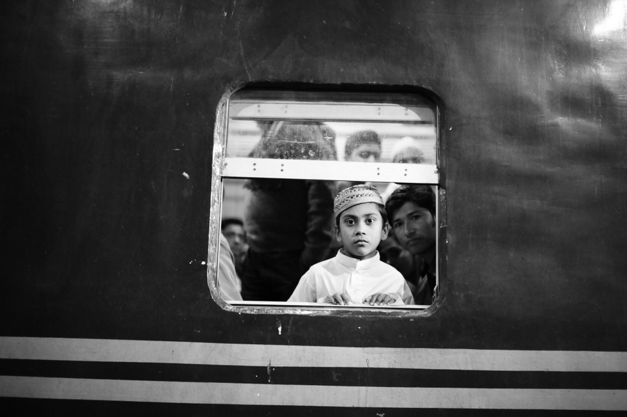 Portrait through a small train window