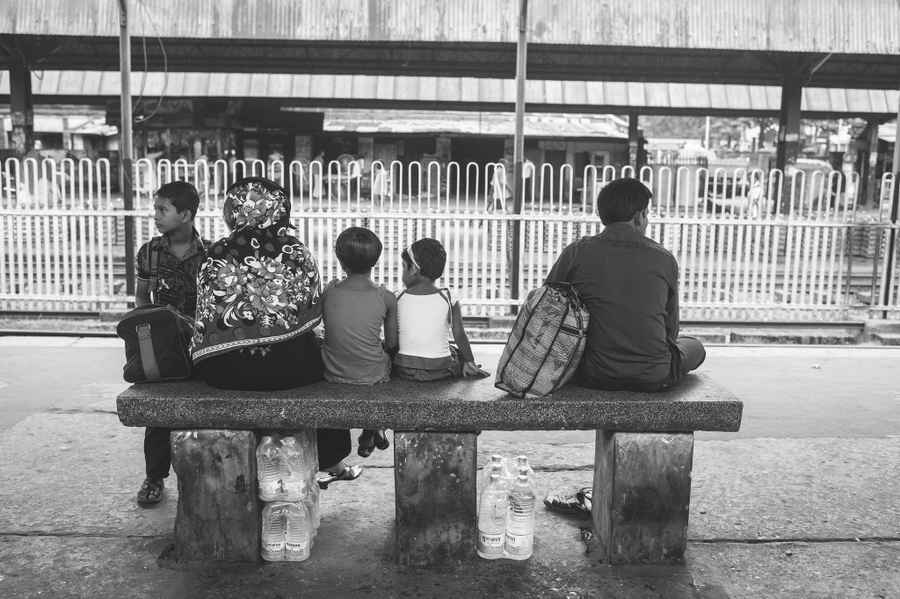People waiting on a railway platform