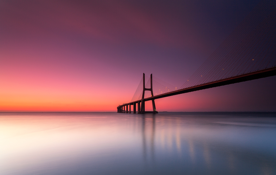 Minimal pier against a pink seascape