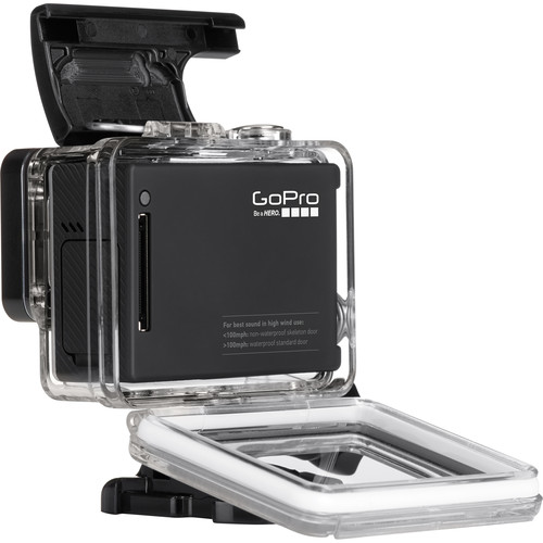 Open GoPro HERO4 housing showing the camera rear and a backdoor with openings