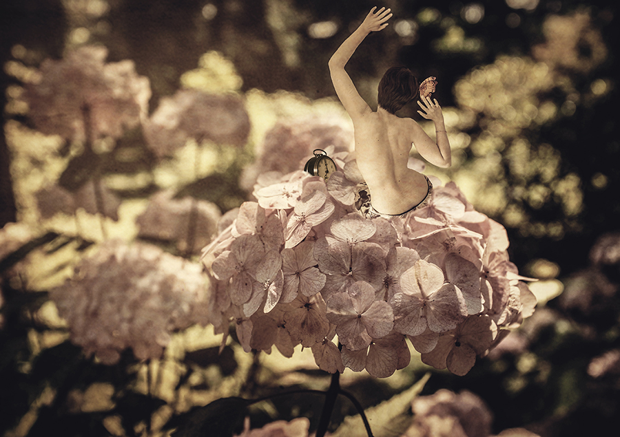 Figure among flowering trees