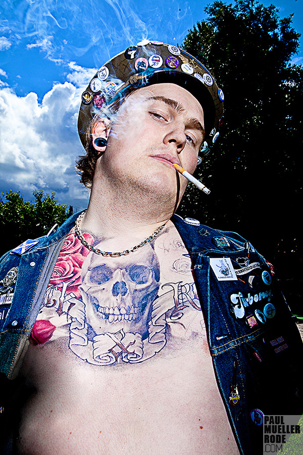 Turbojugend fan in denim vest and cap