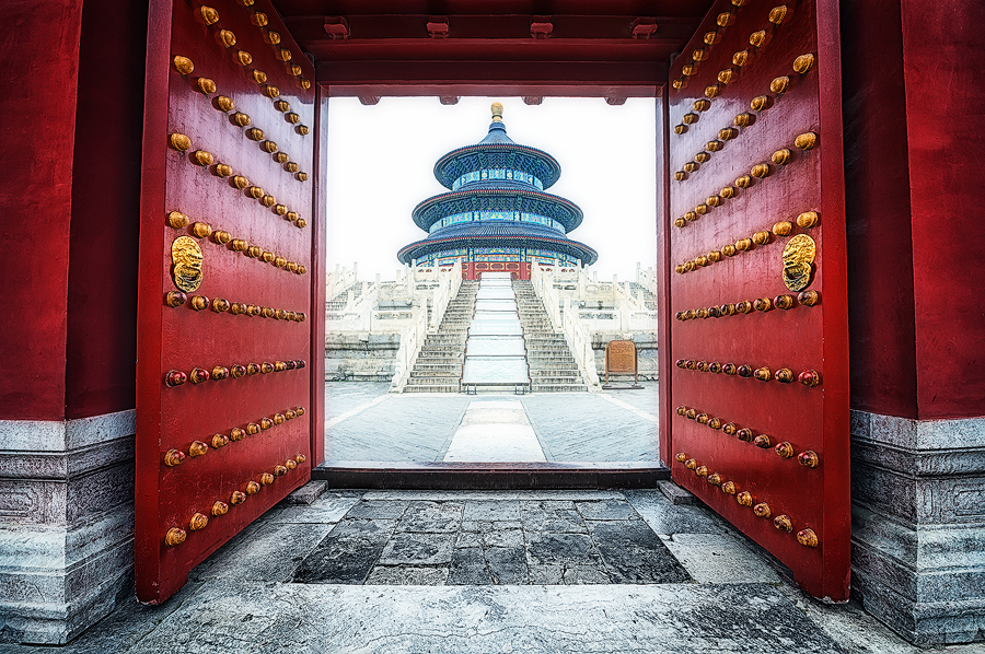 Temple viewed through red doors