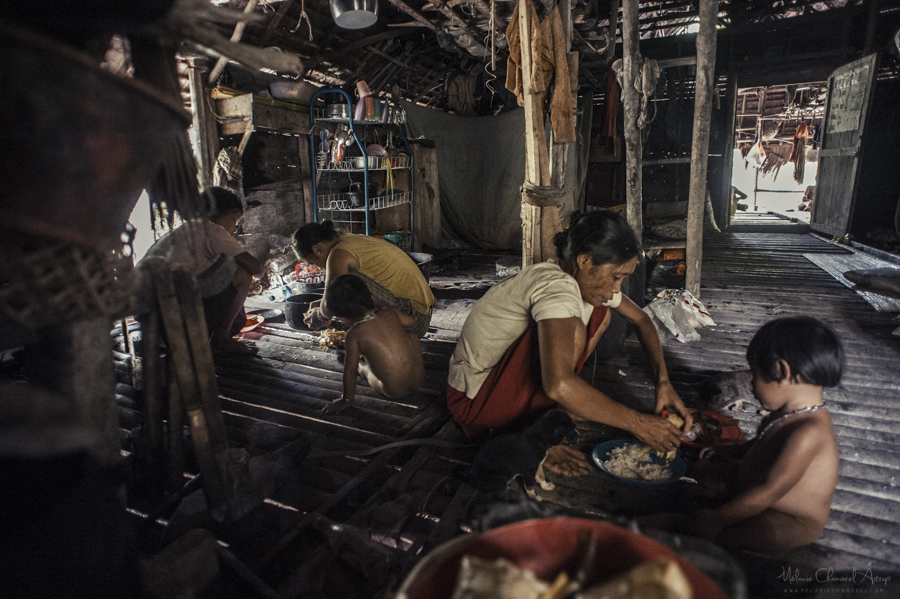 Group seated together inside a house