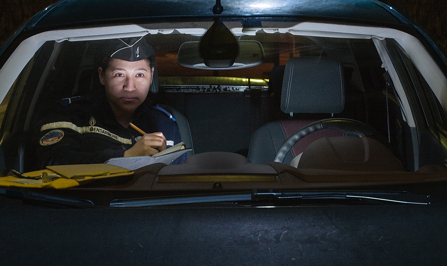 Person eating alone inside a car