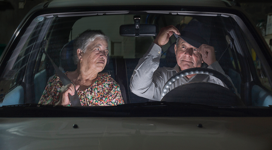 Two people arguing inside a car