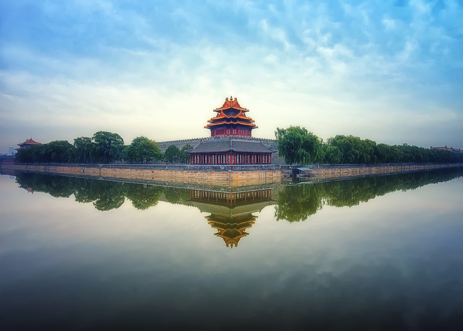 Temple reflected in still water