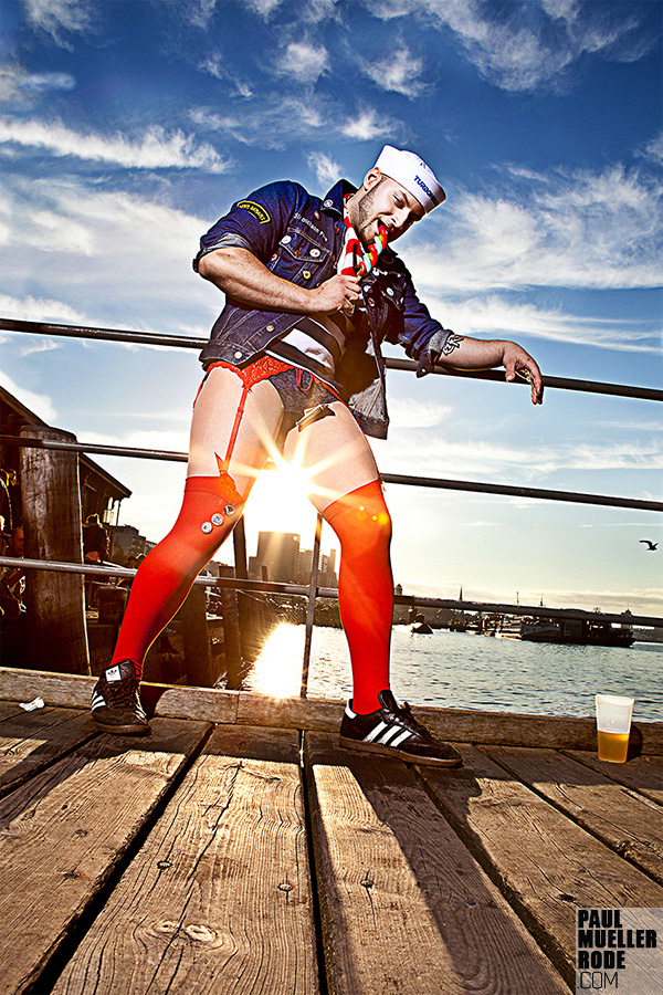 Fan posing on a bridge at sunset