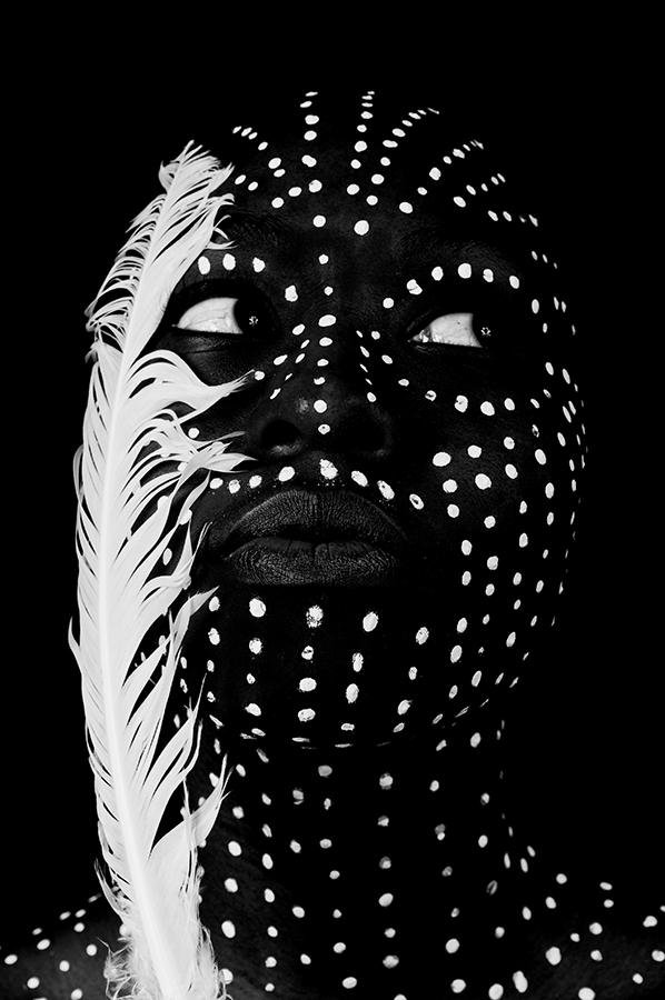 Portrait with dotted decorative face paint