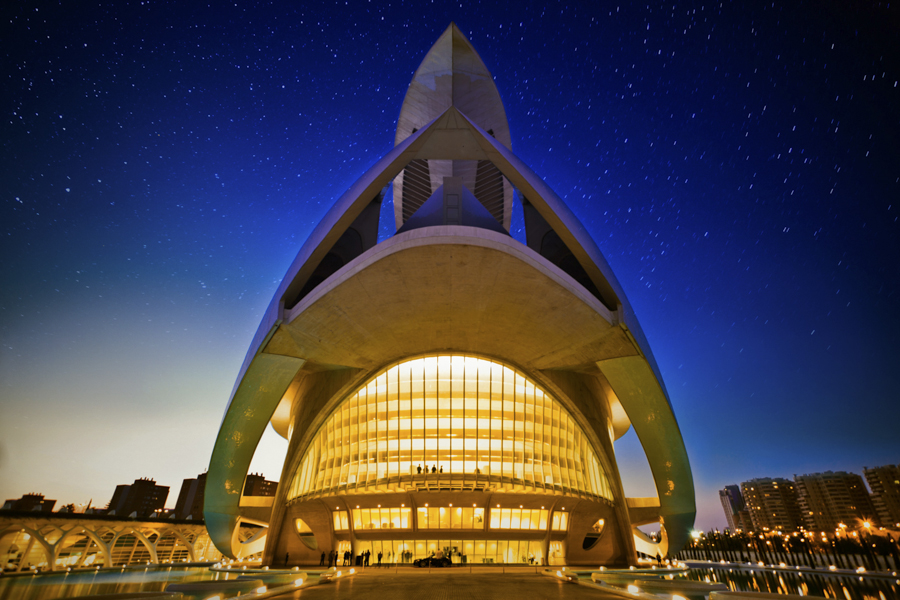 Arched Valencia building under evening sky