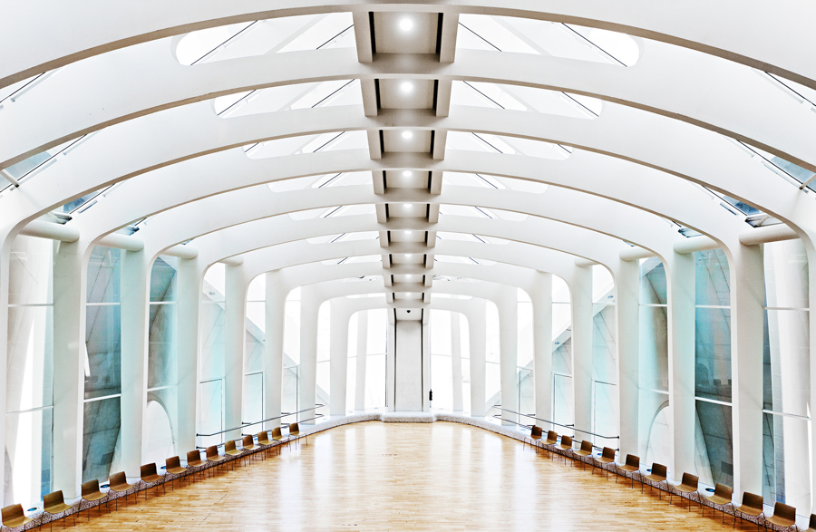 Bright hall with repeating ceiling arches