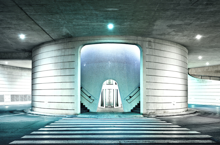 Symmetrical entrance beneath an arched roof