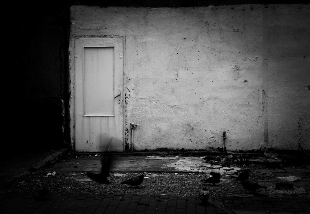 Empty doorway in a weathered wall