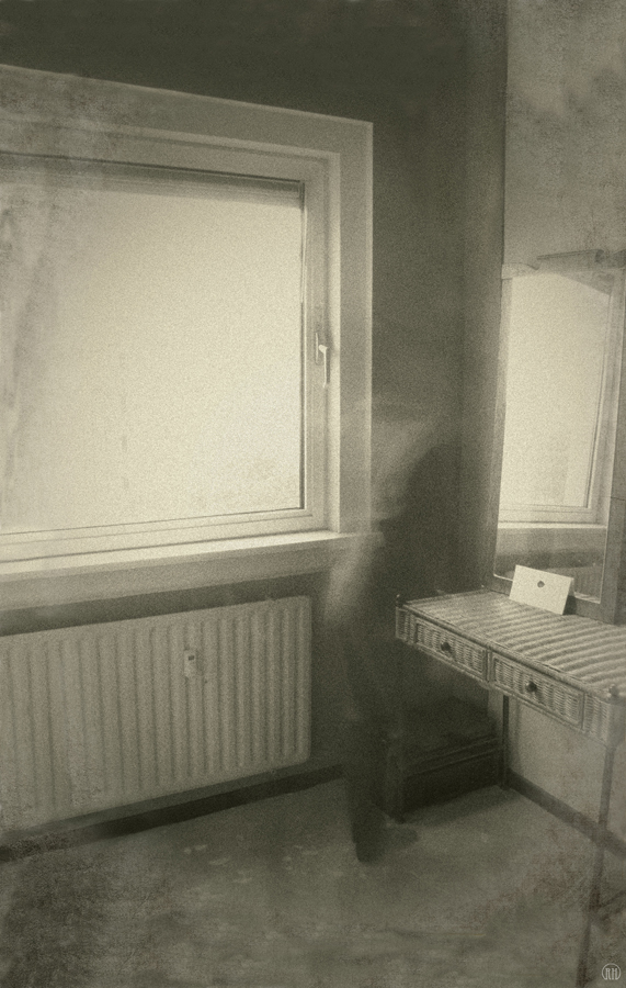 Sunlit window in a dim room