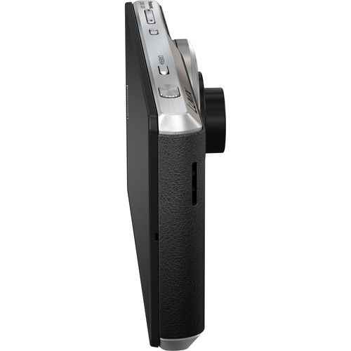 Side view of the Lumix CM1 showing its shutter button, camera selector and protruding lens assembly
