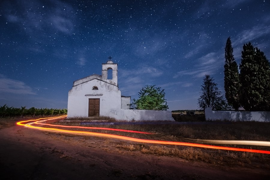 Church at night with car light trails - astrophotography by Joao Santos