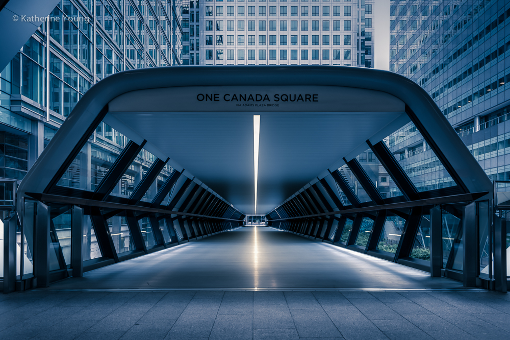 London One Canada Square entrance with symmetrical steel canopy and reflected light