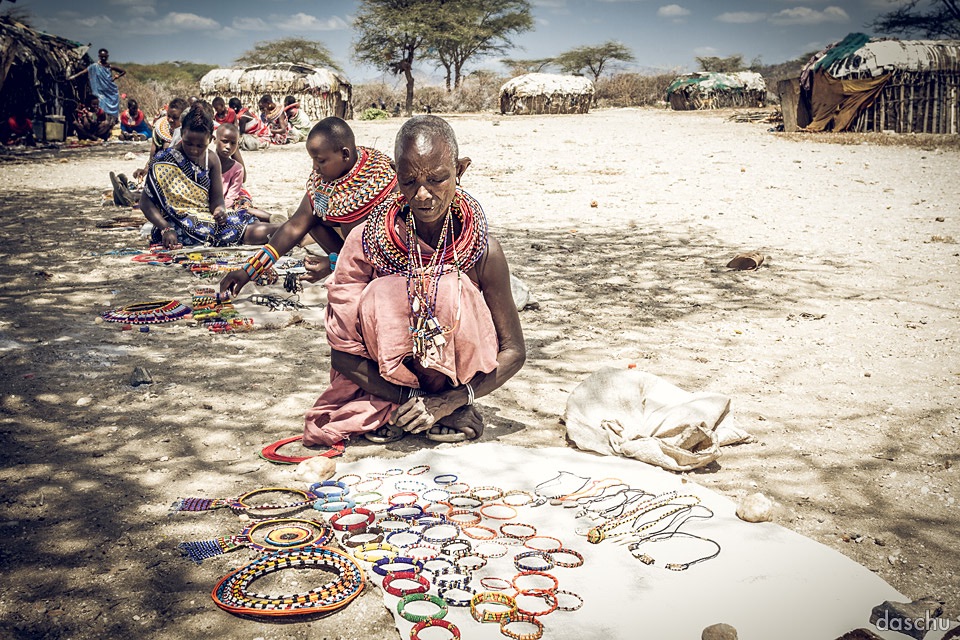 Samburu women selling beaded jewelry in a village, Kenya - Daniel Schuhmacher
