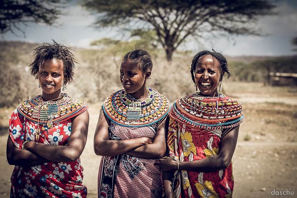 Three Samburu women in traditional beaded collars - Daniel Schuhmacher