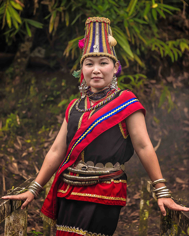 Bidayuh woman in traditional dress and headdress - The Native of Sarawak by Edanan Taiban
