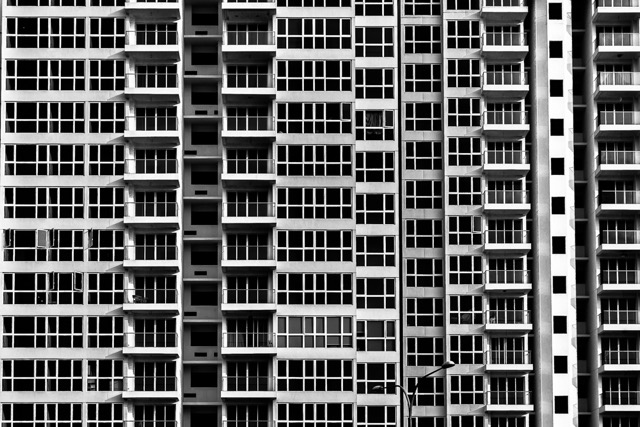 Apartment block facade grid, black and white - Contemporary Architecture in Singapore by Ravi Jambunathan