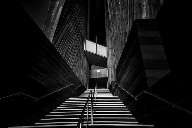 Stairs rising between two towers, black and white - Contemporary Architecture in Singapore by Ravi Jambunathan