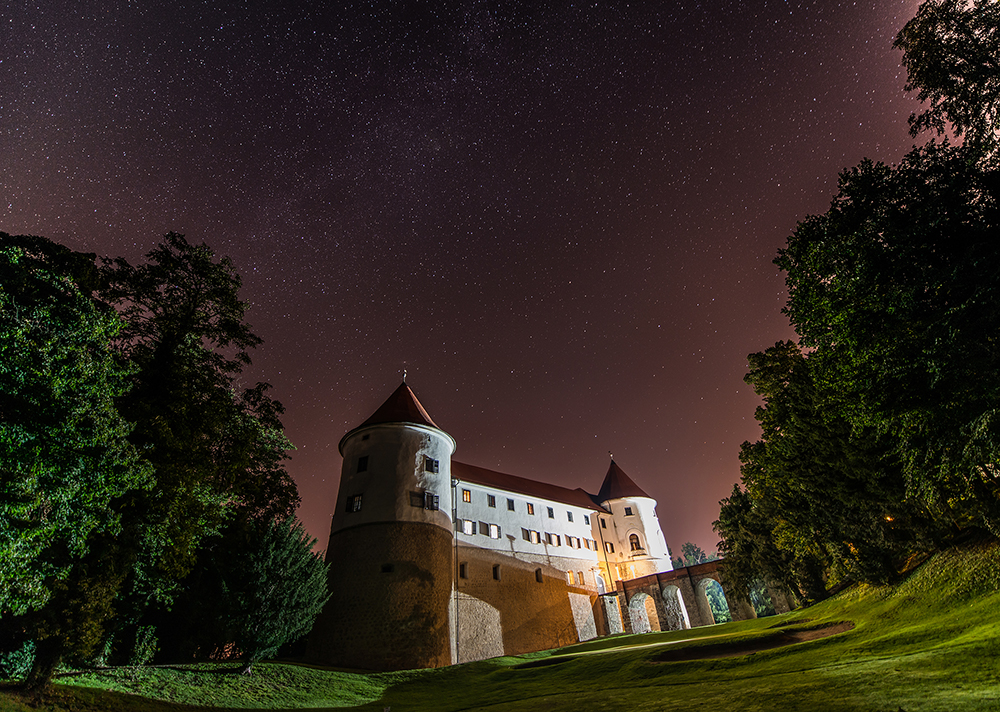 Mokrice castle at night under the Milky Way, Slovenia - Ales Krivec