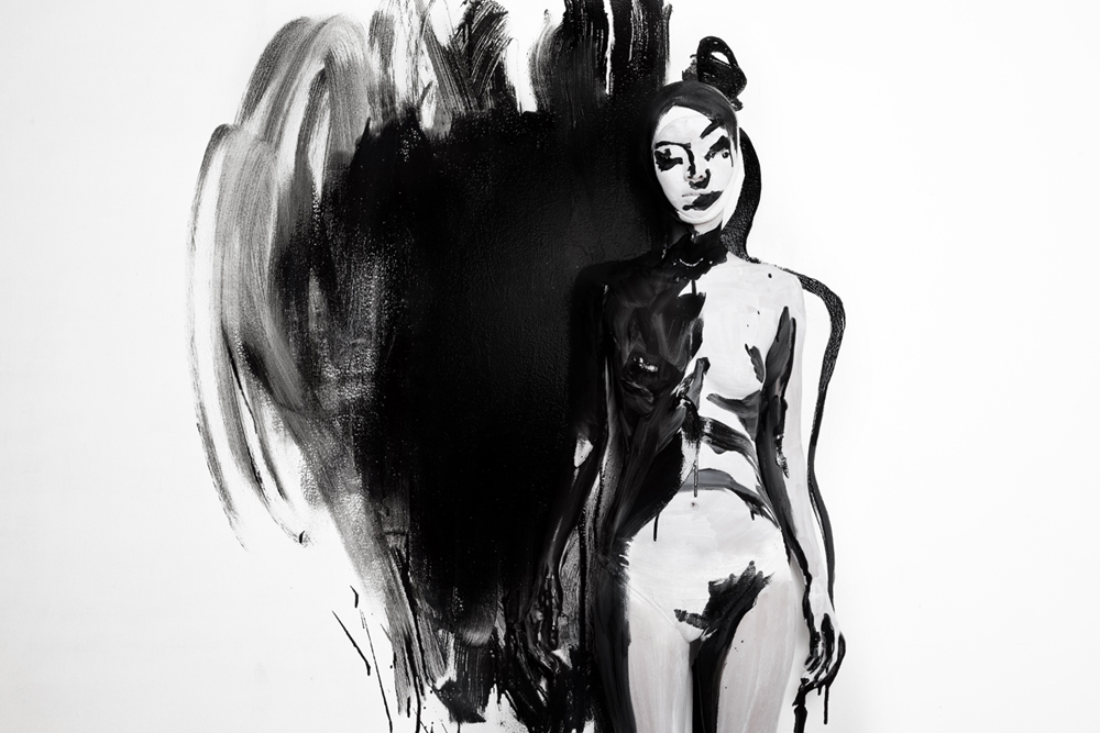 Woman against a splash of black paint - Metamorphosis Black Butterfly by Olga Volodina
