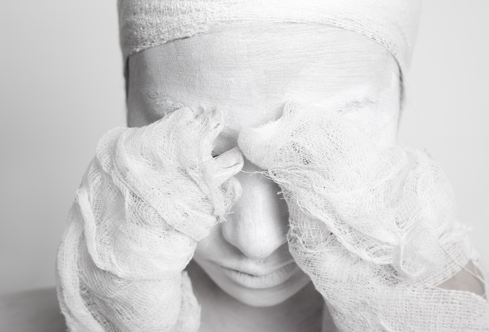 Bandaged face with white-gloved hands - Metamorphosis Black Butterfly by Olga Volodina