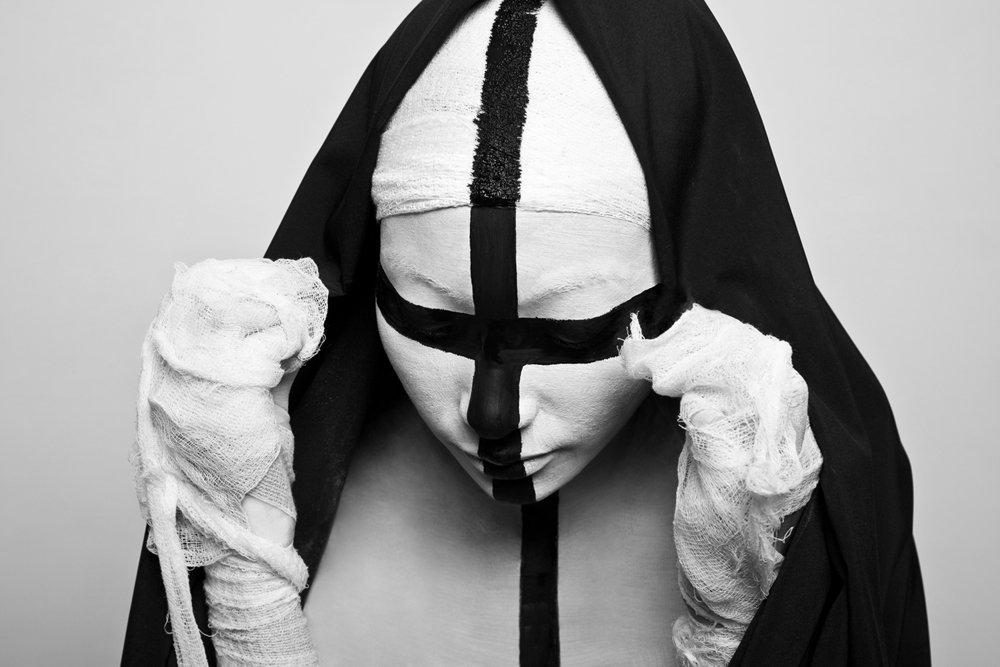 Veiled figure in bandages and black ribbon - Metamorphosis Black Butterfly by Olga Volodina