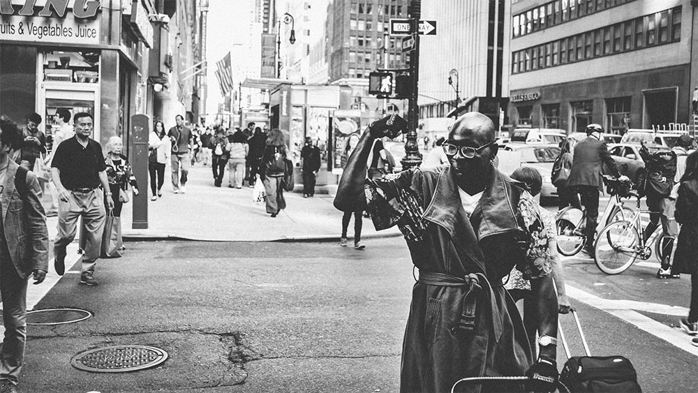 Woman with a camera on a Midtown sidewalk - New Yorkers by Lebrvn Creations