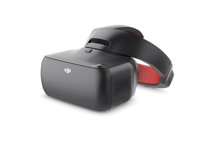 DJI Goggles RE black goggles with red padded headband seen at an angle