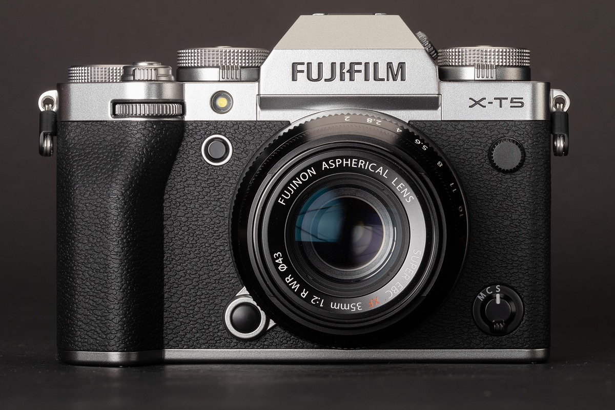 Fujifilm X-T5 silver-and-black camera with a Fujinon 35mm lens, front view