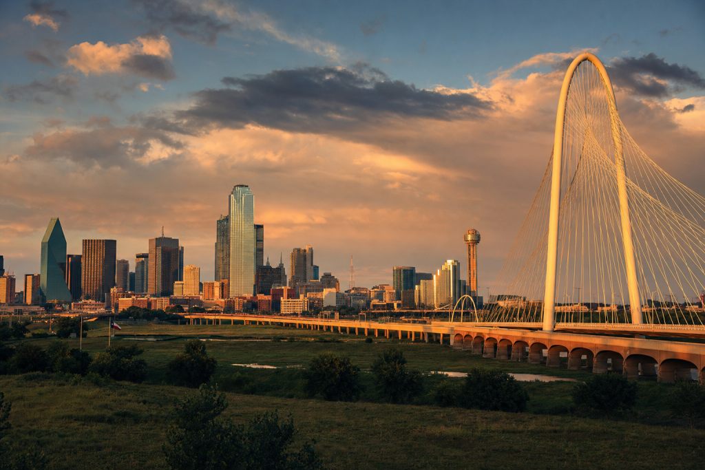 Dallas at golden hour, iconic landmarks visible, dramatic warm light