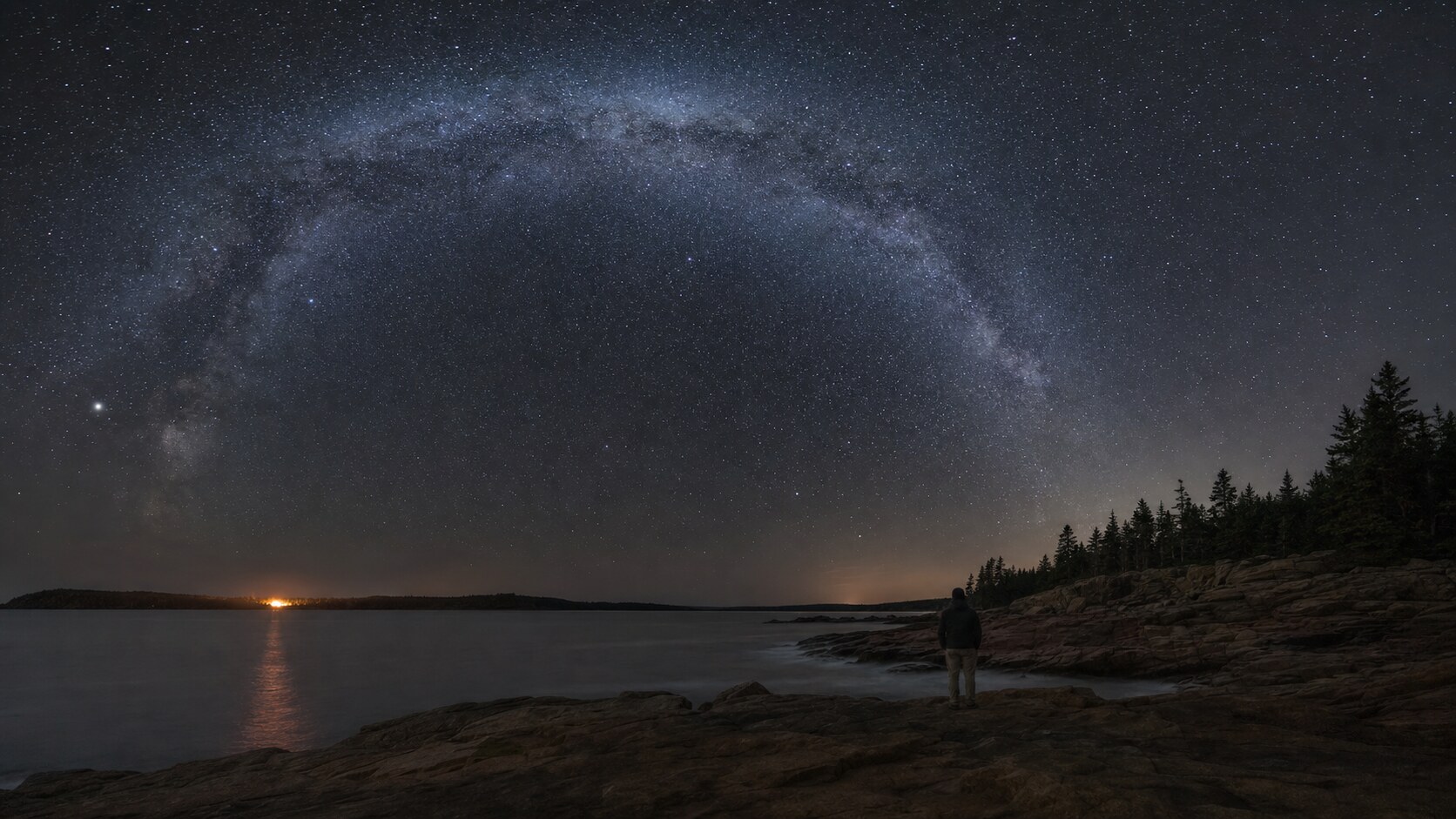 Milky Way and night sky over the iconic landmark of Acadia National Park — a classic astrophotography composition for the park