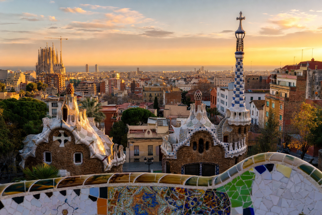 Barcelona skyline at golden hour with iconic landmarks in warm light