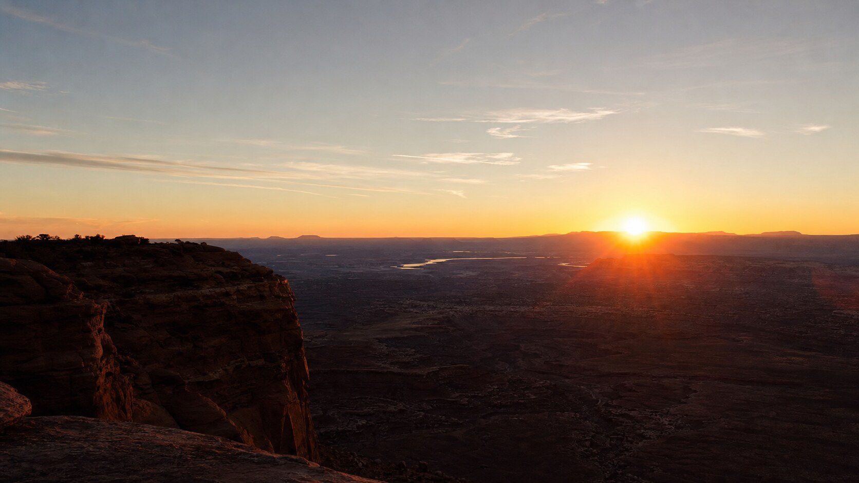Canyonlands skyline at sunset, photographed from the city's best-known public viewpoint — a top spot for photography in Canyonlands