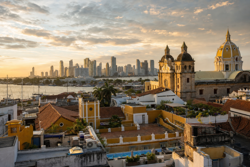 Cartagena skyline at golden hour with iconic landmarks in warm light