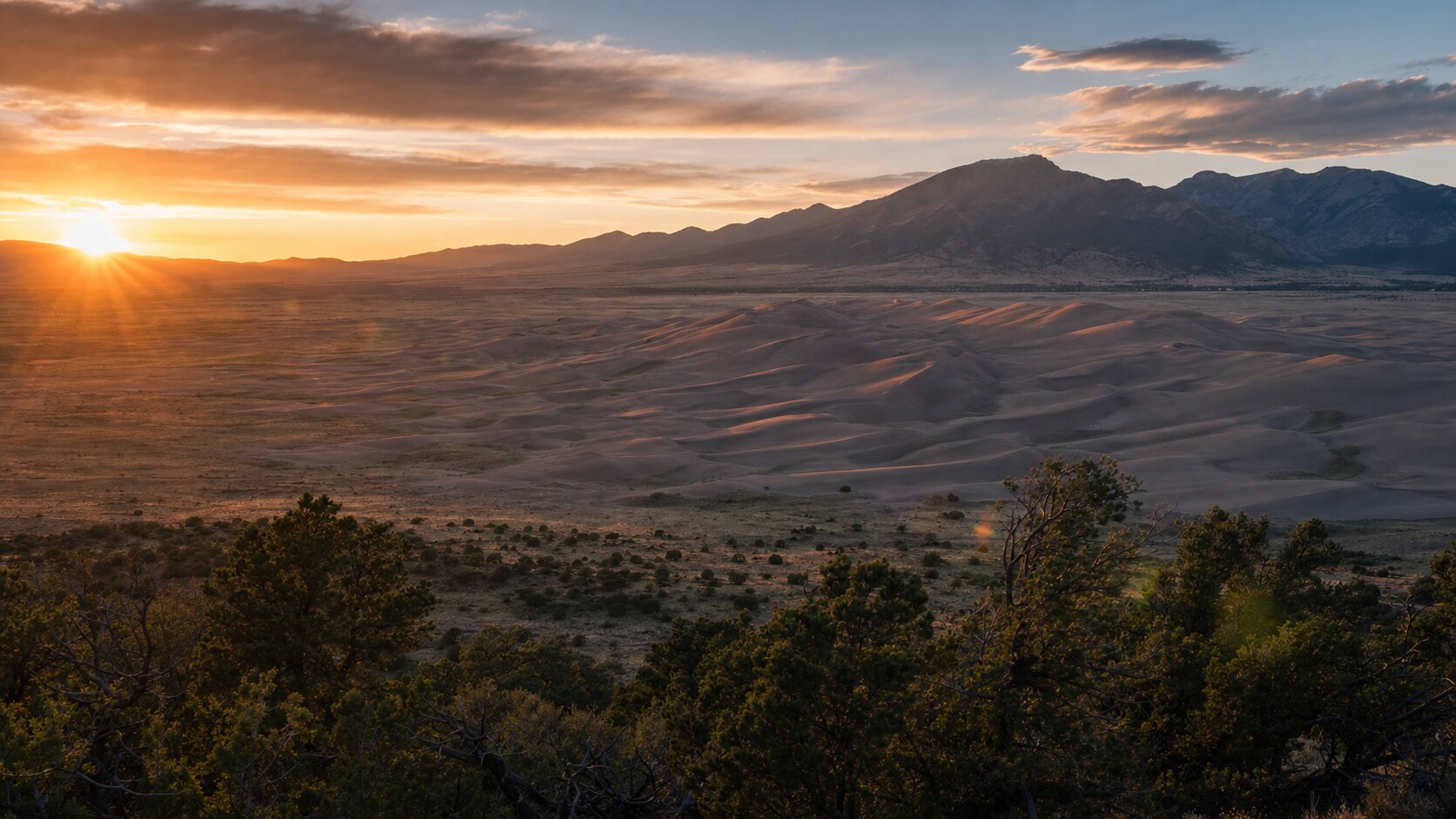 Great Sand Dunes skyline at sunset, photographed from the city's best-known public viewpoint — a top spot for photography in Great Sand Dunes