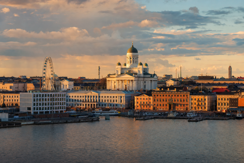 Helsinki skyline at golden hour with iconic landmarks in warm light