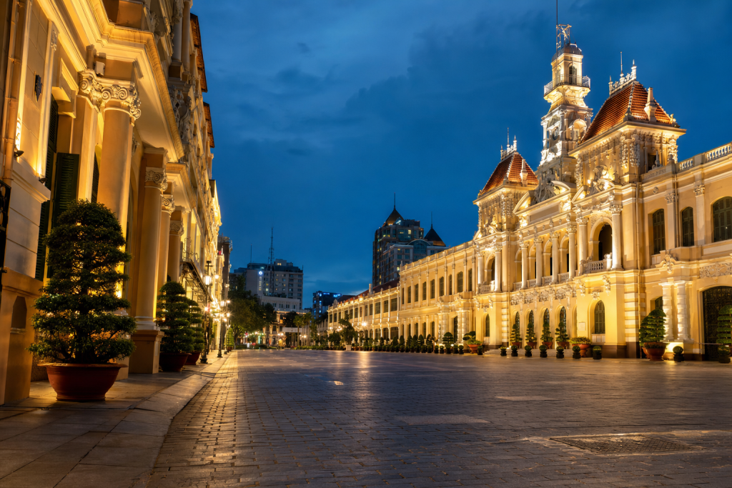 Street view in Ho Chi Minh City, leading lines, architectural detail, blue hour with mixed ambient and street