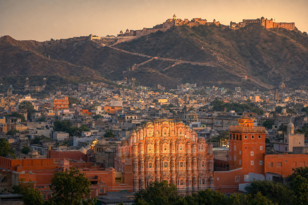 Jaipur skyline at golden hour with iconic landmarks in warm light