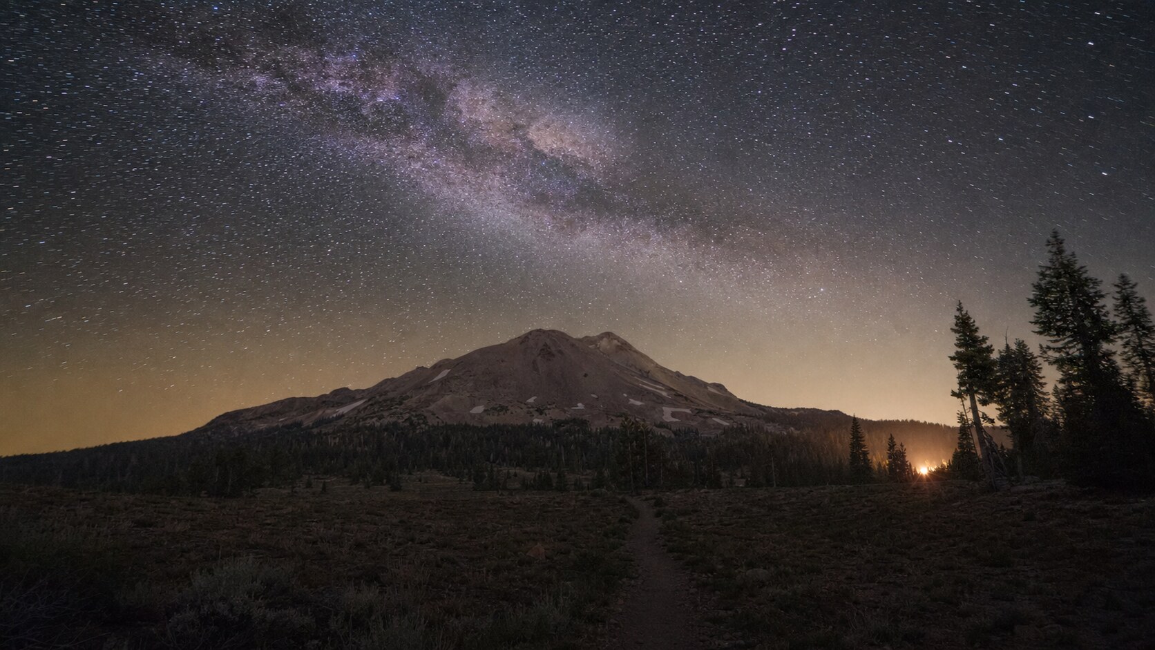 Milky Way and night sky over the iconic landmark of Lassen Volcanic National Park — a classic astrophotography composition for the park