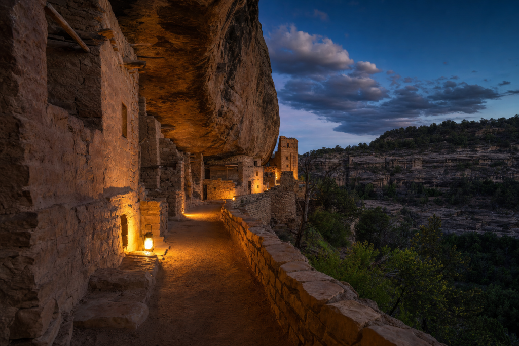 Street view in Mesa Verde, leading lines, architectural detail, blue hour with mixed ambient and street lighting