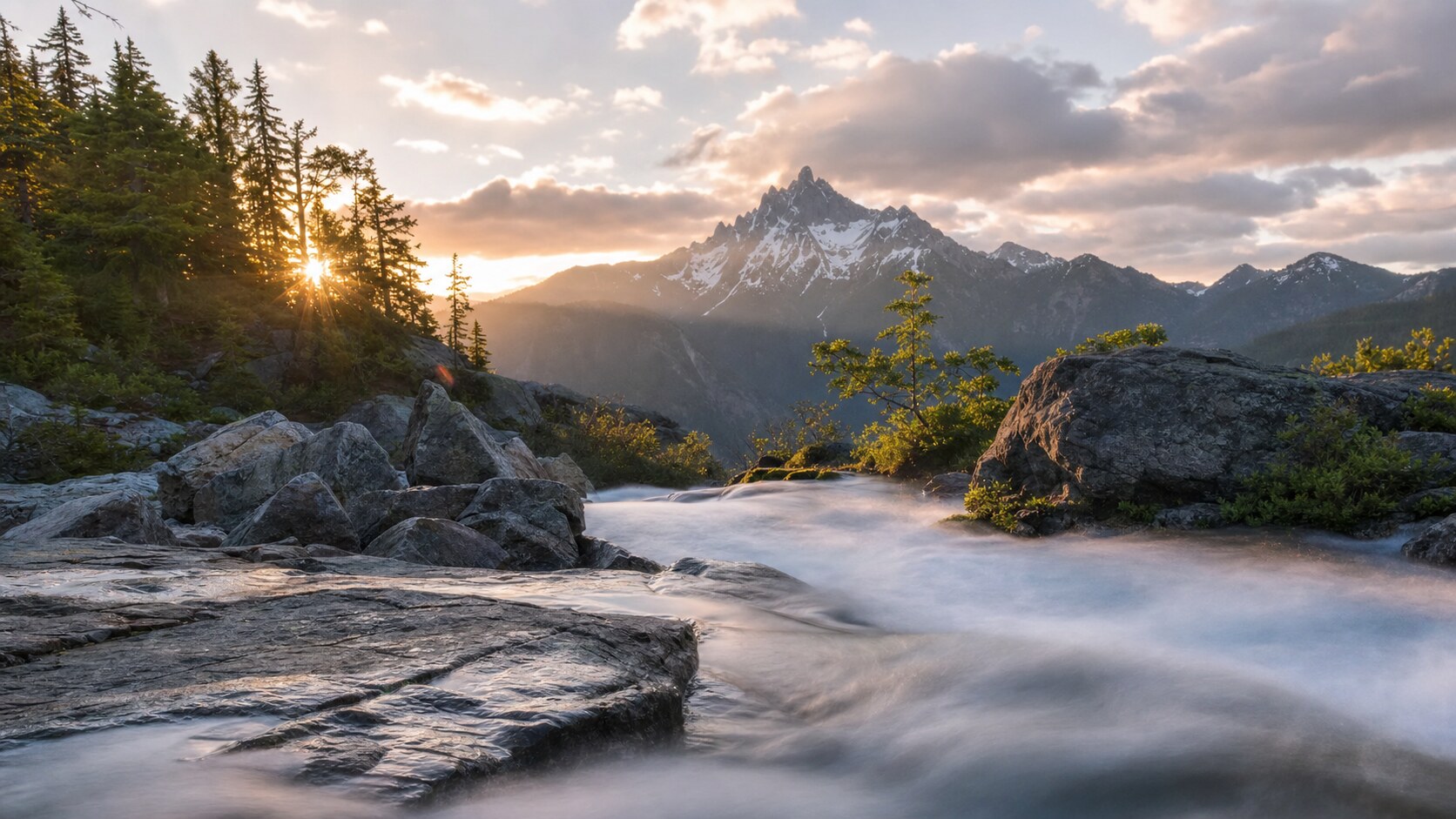 Sunrise landscape photograph at North Cascades National Park from the most popular sunrise overlook, showing the signature foreground-to-background composition