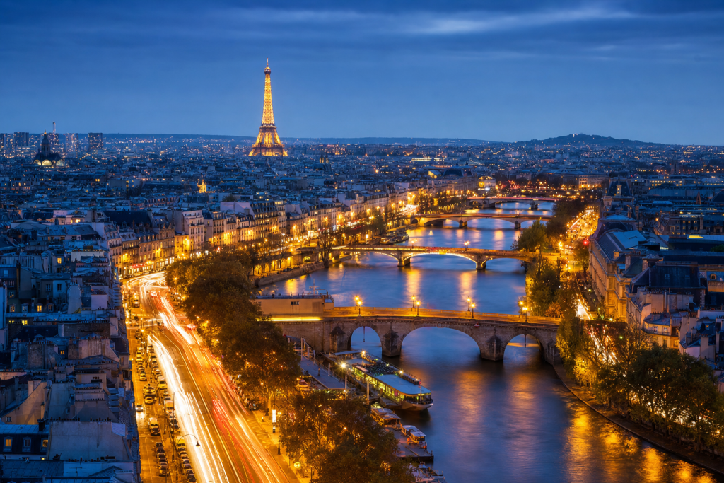 Paris high-vantage cityscape at blue hour with city lights and traffic motion